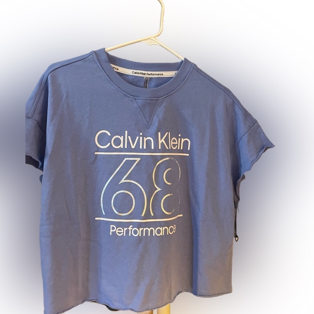 Calvin Klein performance top.​ Preloved, cropped! Msrp is $49.50!!​
